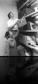 Don and Gloria Load Vinyl Records Shelf